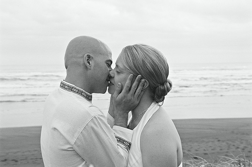 Jon and Marja at their wedding on Piha Beach in New Zealand.
